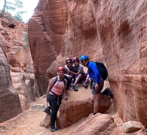 Family exploring a canyon in Utah