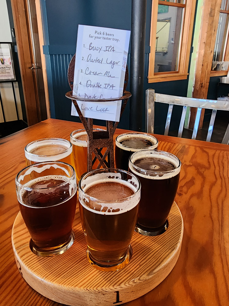 a tasting flight of beer on a table in Astoria, Oregon