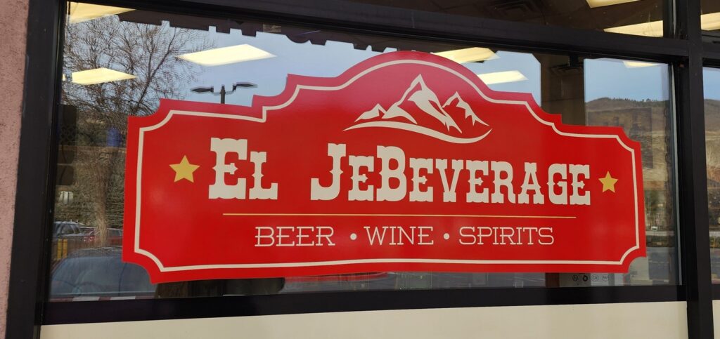 window sign at a liquor store